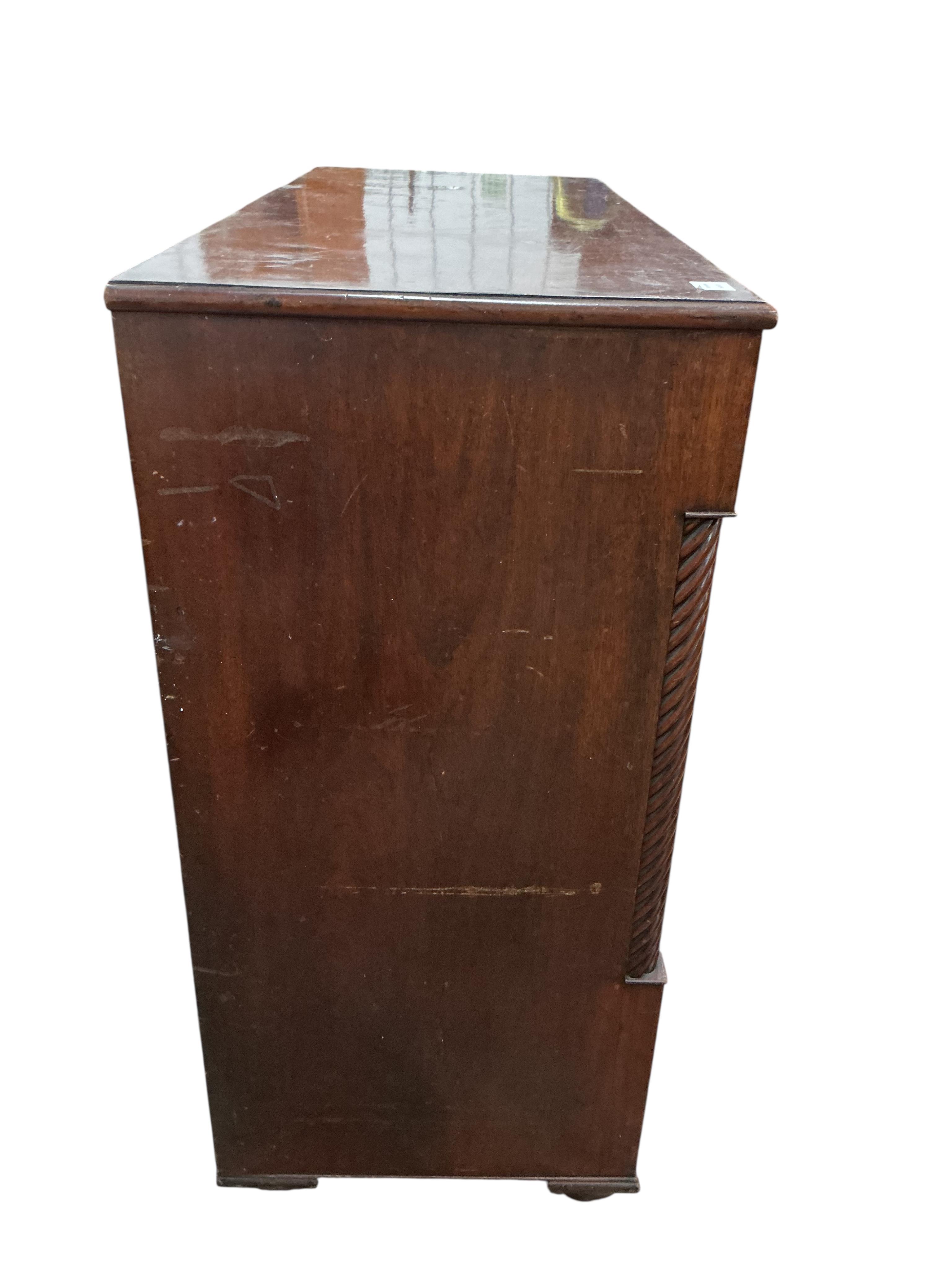 A George IV mahogany chest of drawers, canted corners and bone escutcheons, width 129cm, depth 53cm, height 113cm